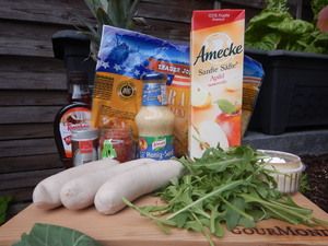 Zutaten: weiße Bratwürste, Rucola, Fladenbrot, Honig und Saucen
